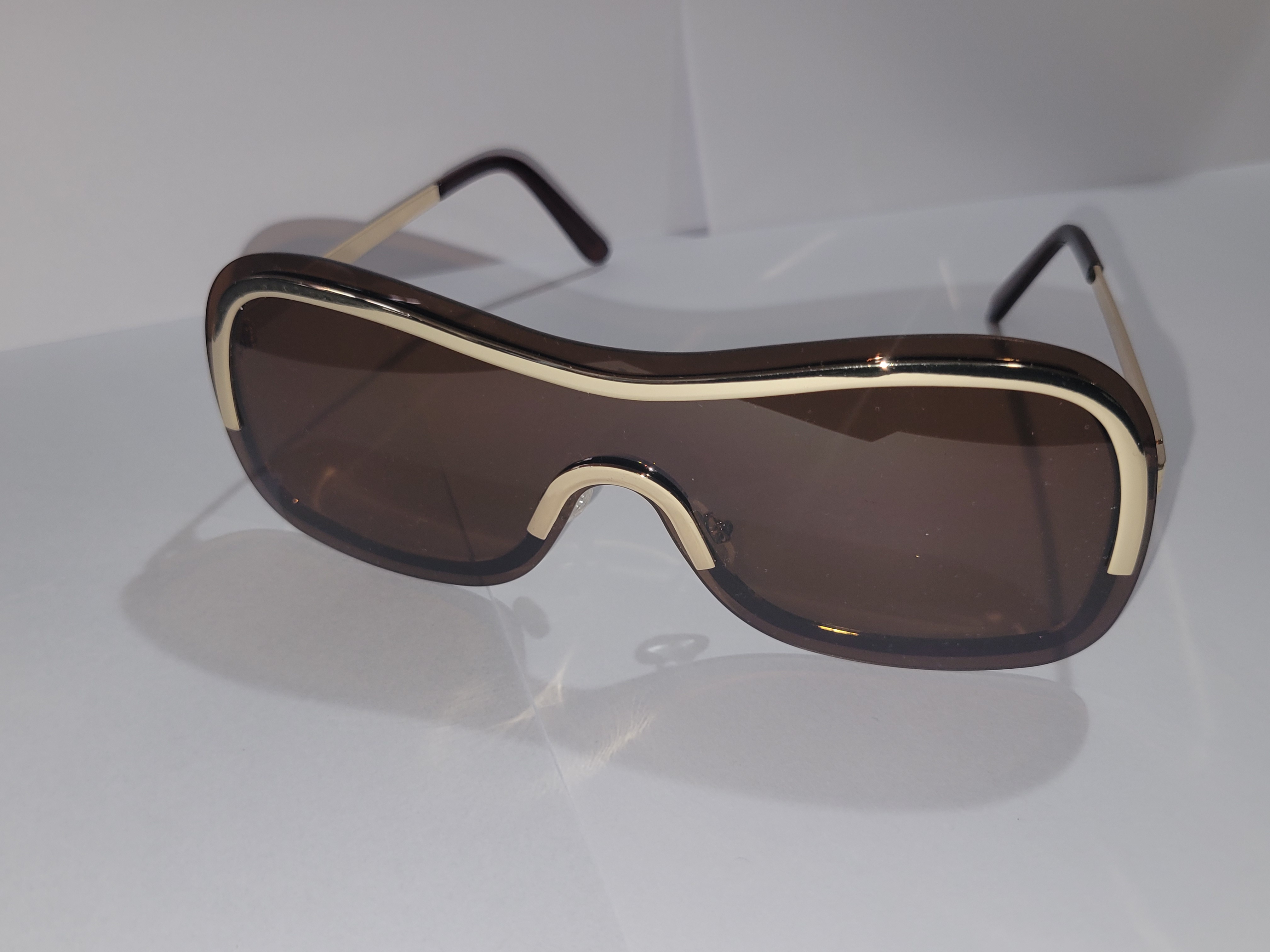 #25-Rimless Reality Sunglasses