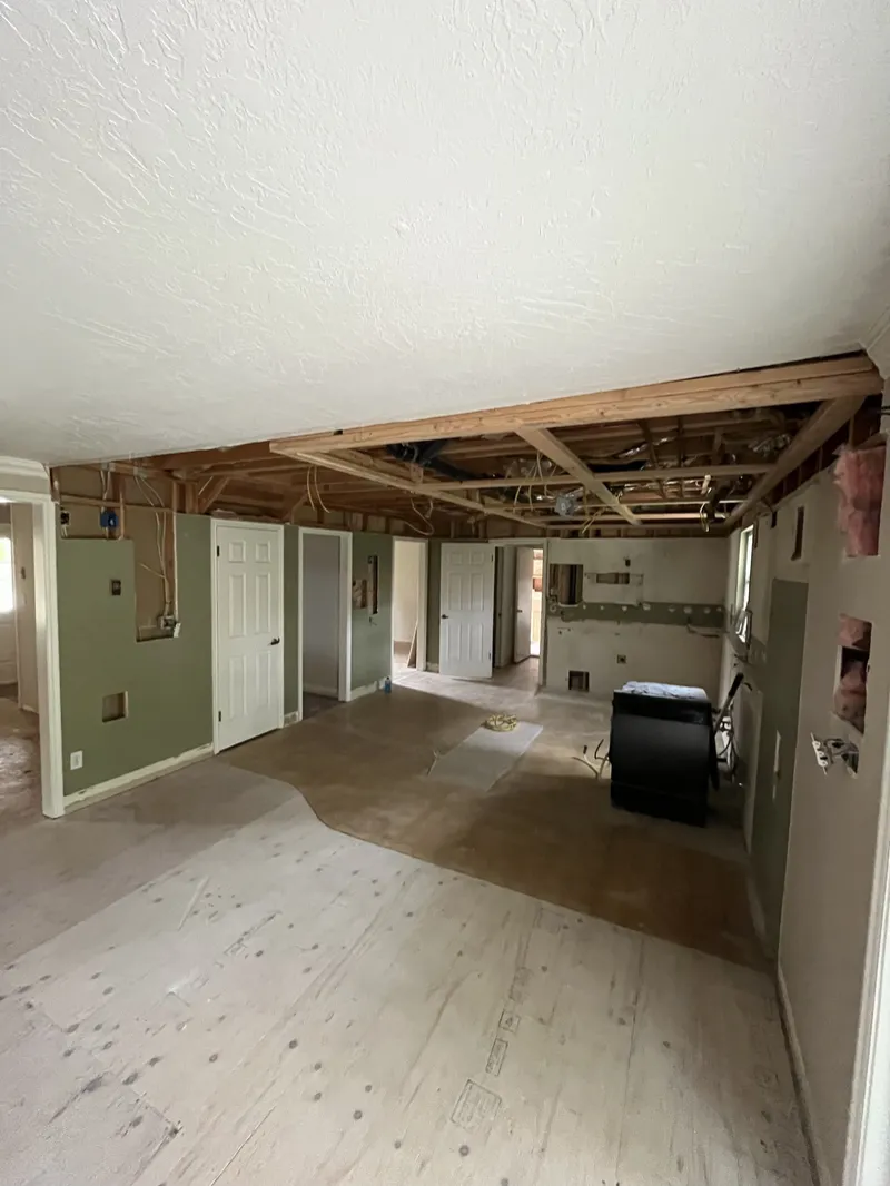 Main living area opened up to the studs during a full remodel