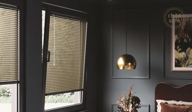 Aluminium venetian blinds on tilt and turn windows in a bedroom, Eclipse SBC serving Grantham