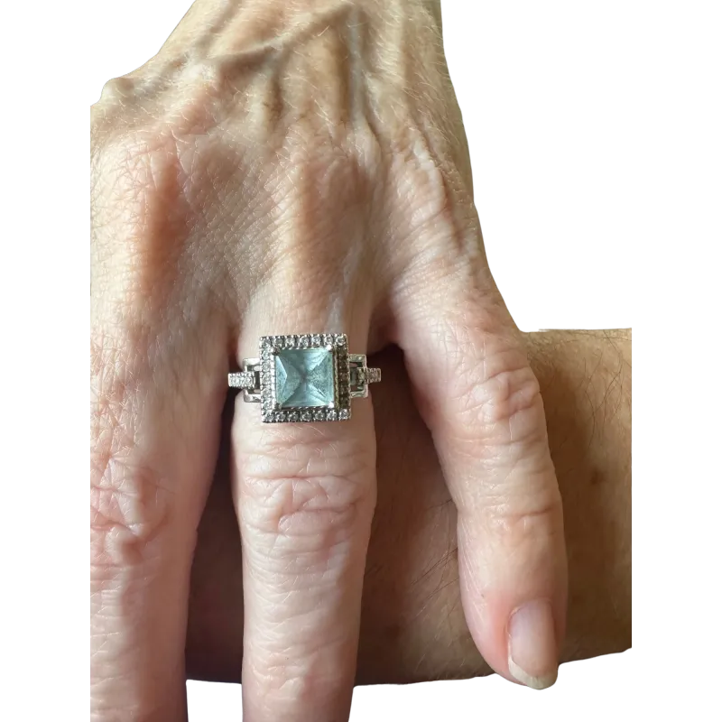 Aquamarine and Diamond Halo Ring