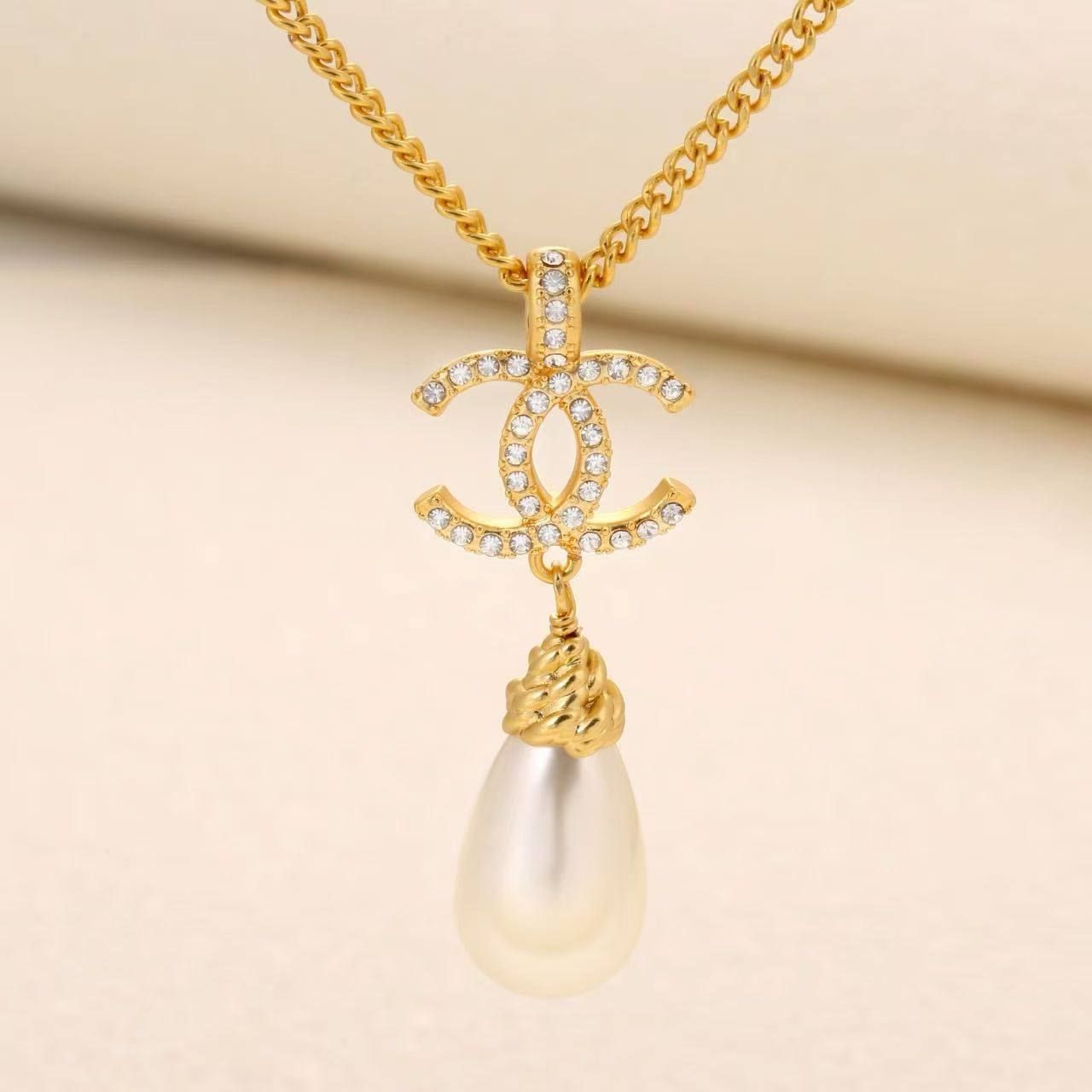 Chanel Inspired Pearl & CC Emblem Necklace (Master Copy) - Gold Crystal Pave Pendant | D-E32