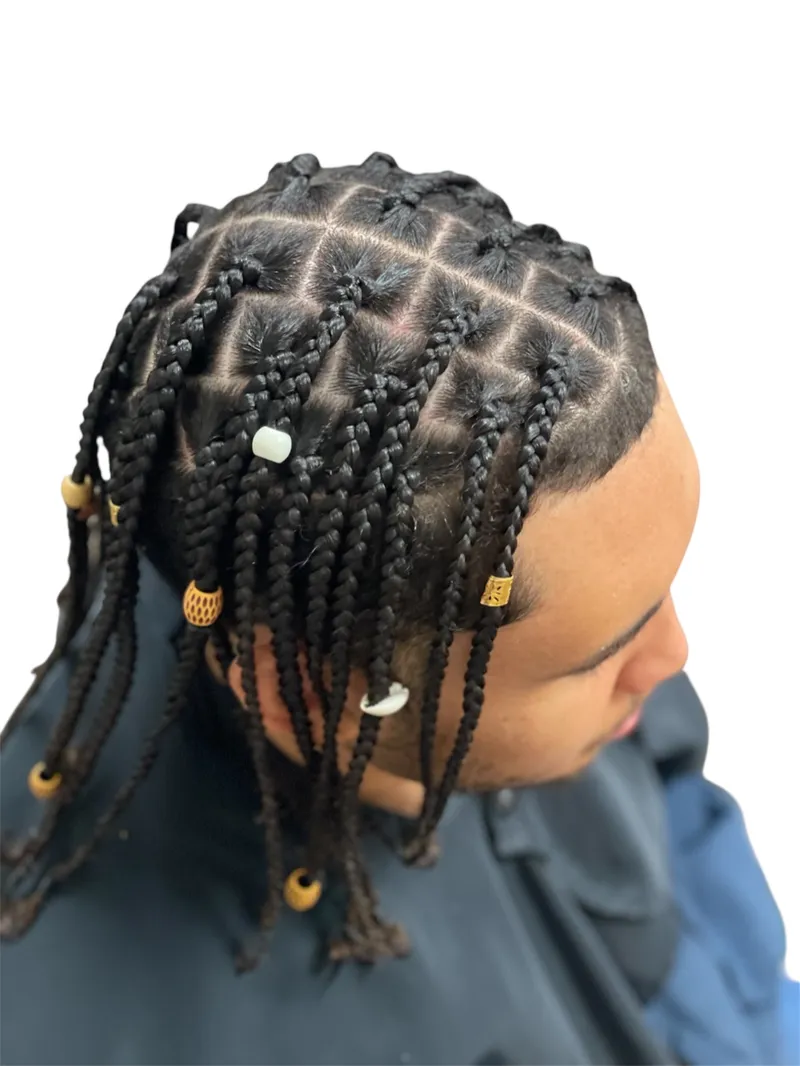 Accessorized box braids hairstyle