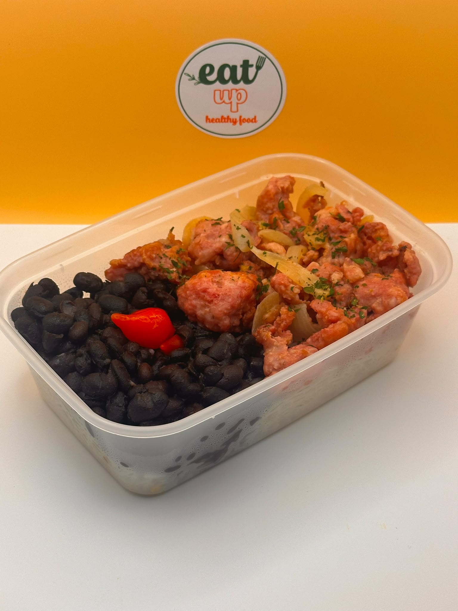 Brazilian-style pork sausage with onions, rice and black beans