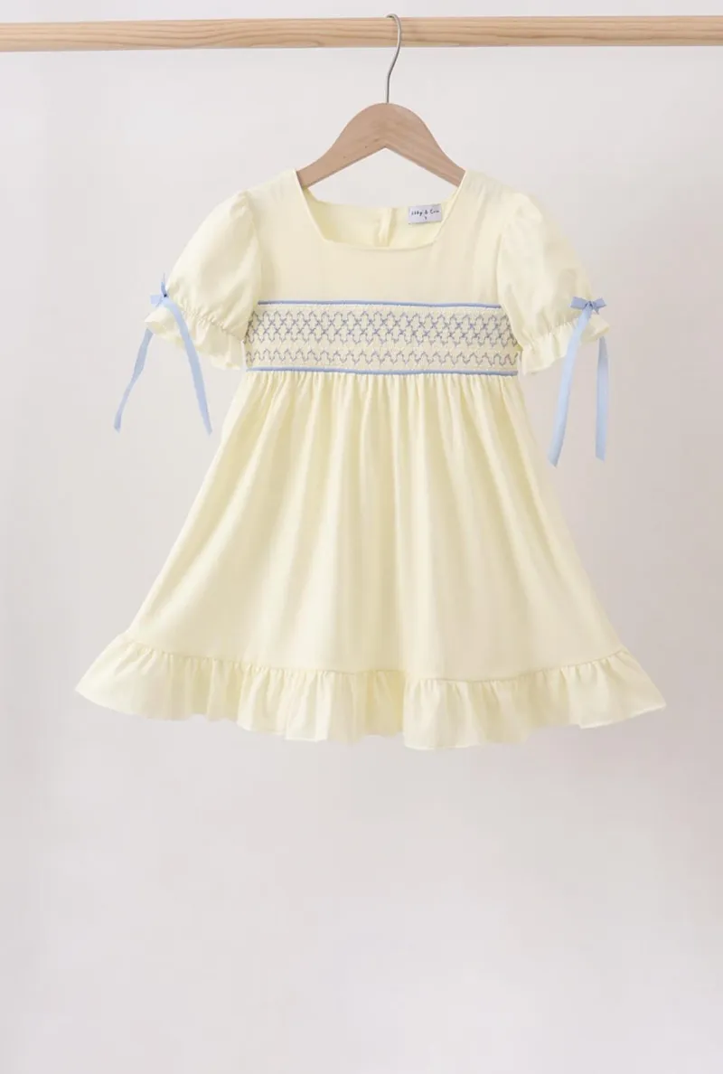 Cream Smocked Ruffle Dress