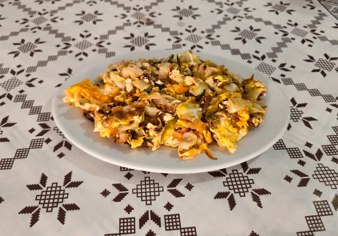 Grated fried cabbage mixed with eggs