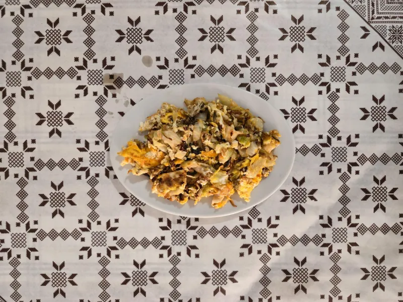 Cubed fried marrow mixed with eggs (courgette)