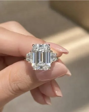 IGI certified 8.09 carat total weight emerald cut E-color VS1 Lab Diamond Engagement Ring set in 18k white gold. 