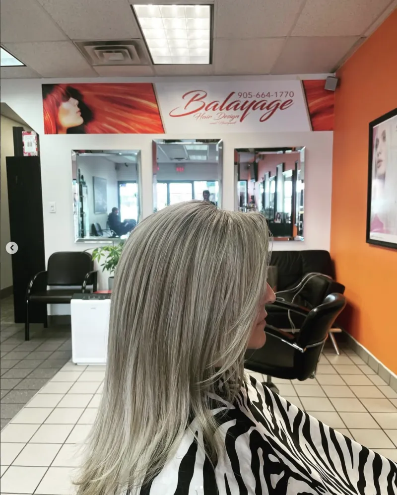 Soft blended blonde on long haircut