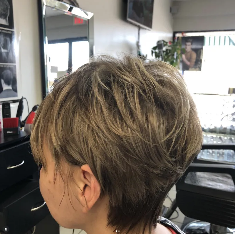Long layered haircut with soft highlights