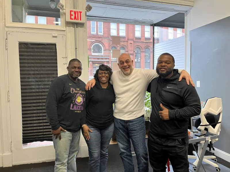 Andrew Monastra with members after Title Training