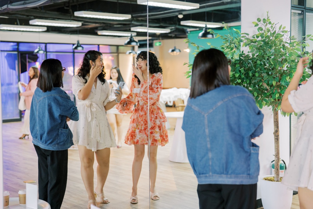 A group of FWIB members laughing together