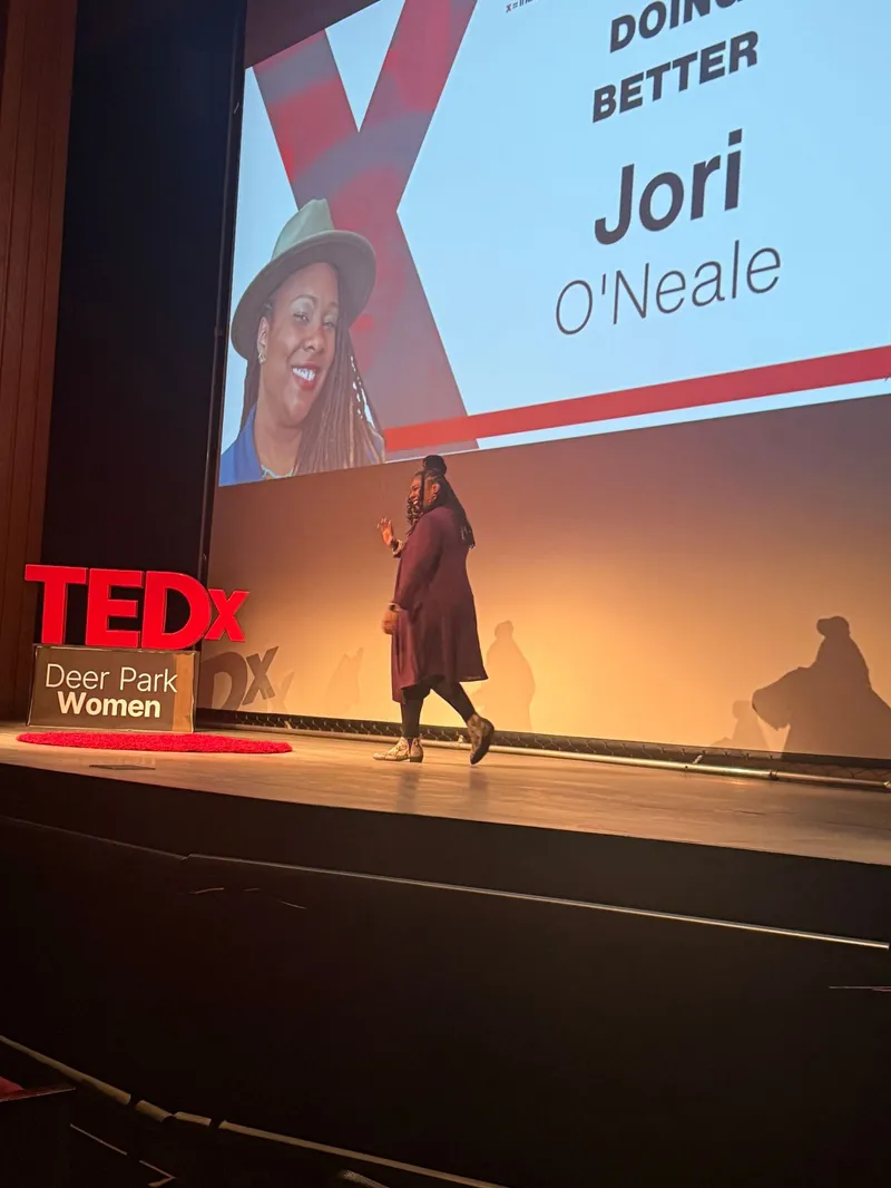 Jori O'Neale speaking on the TEDx stage