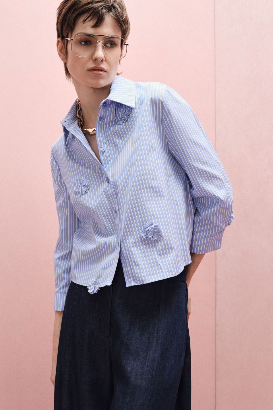 SHIRT WITH STRIPED PATTERN AND FLORAL APPLIQUÉS