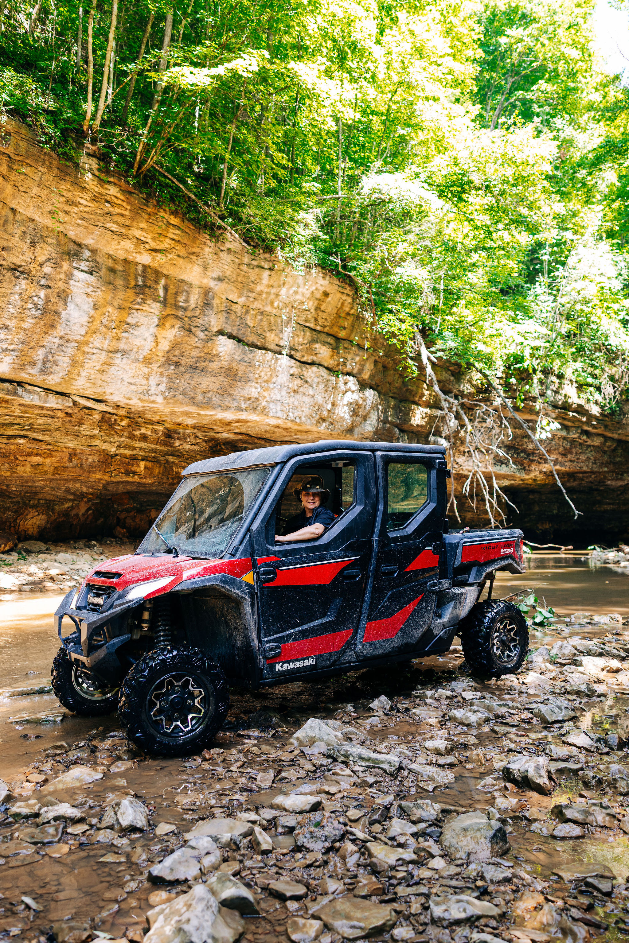 Kim, your Coalbank Holler guide, at the wheel in a Red River Gorge creek bed