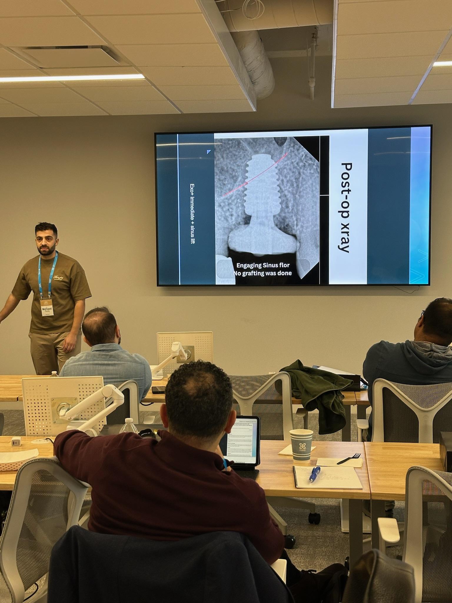 Dr. Faraj teaching implant technique to practicing dentists
