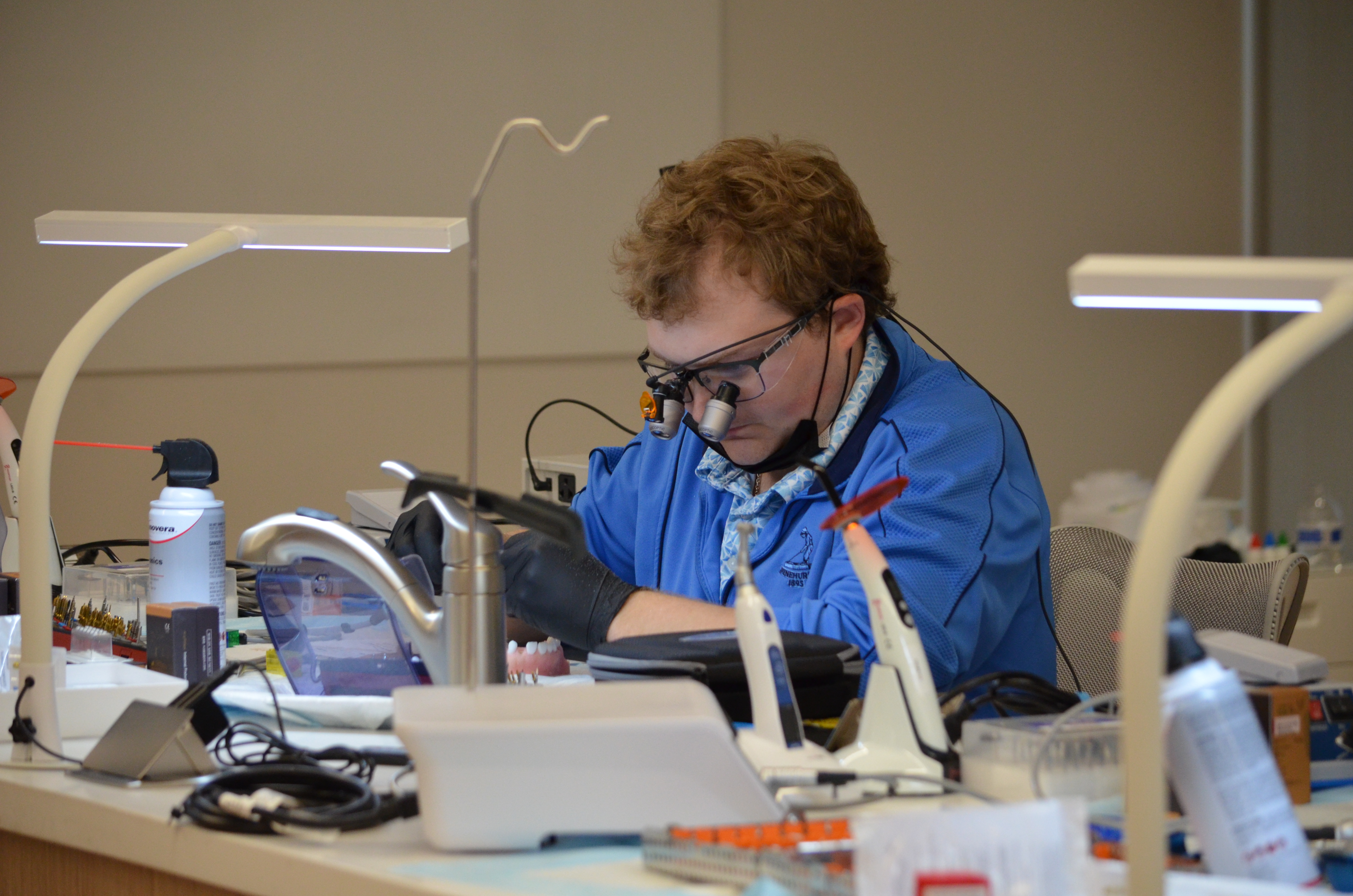 Dr. Faraj teaching implant techniques to other dentists