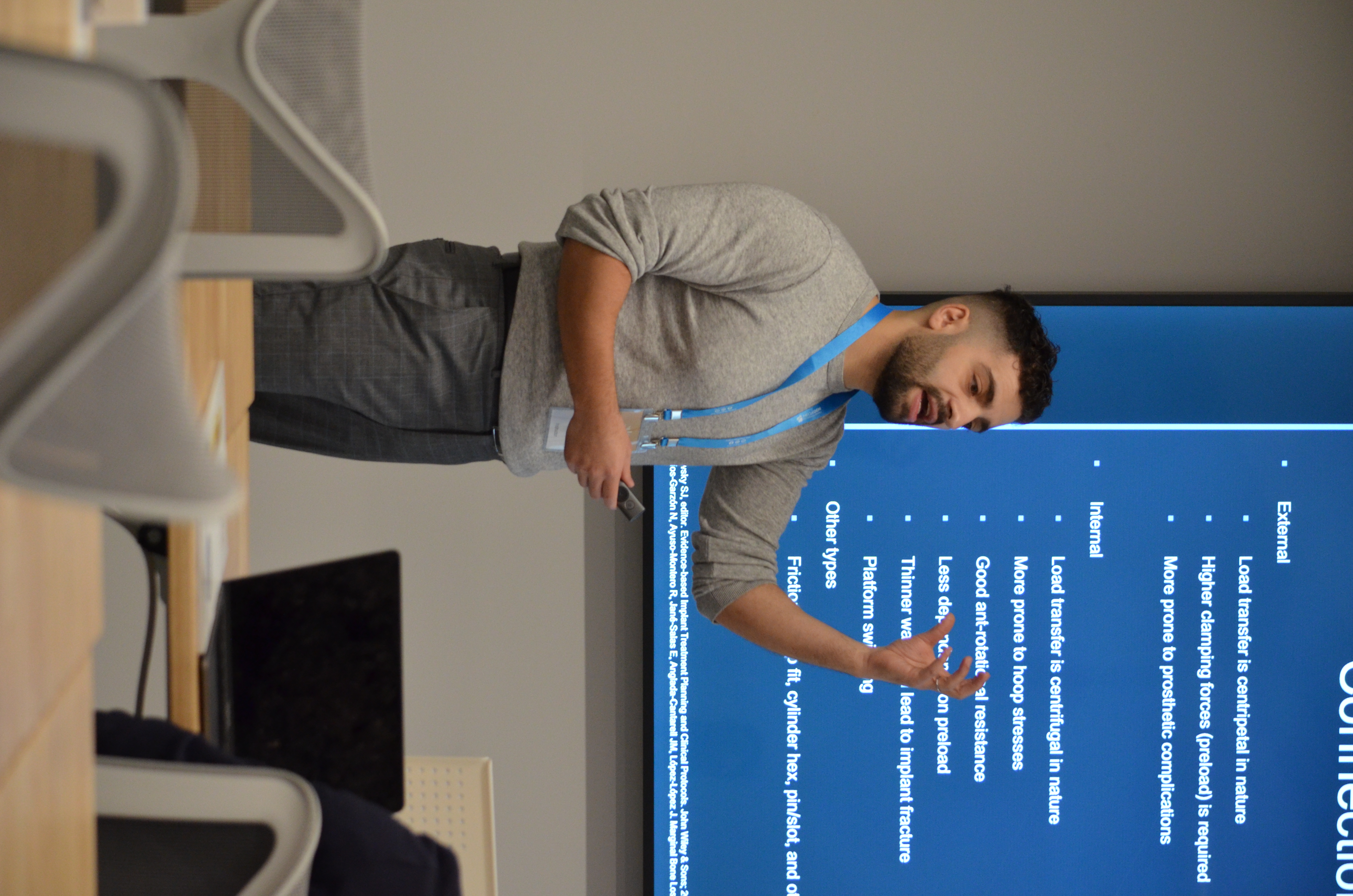 Dr. Faraj teaching implant techniques to other dentists