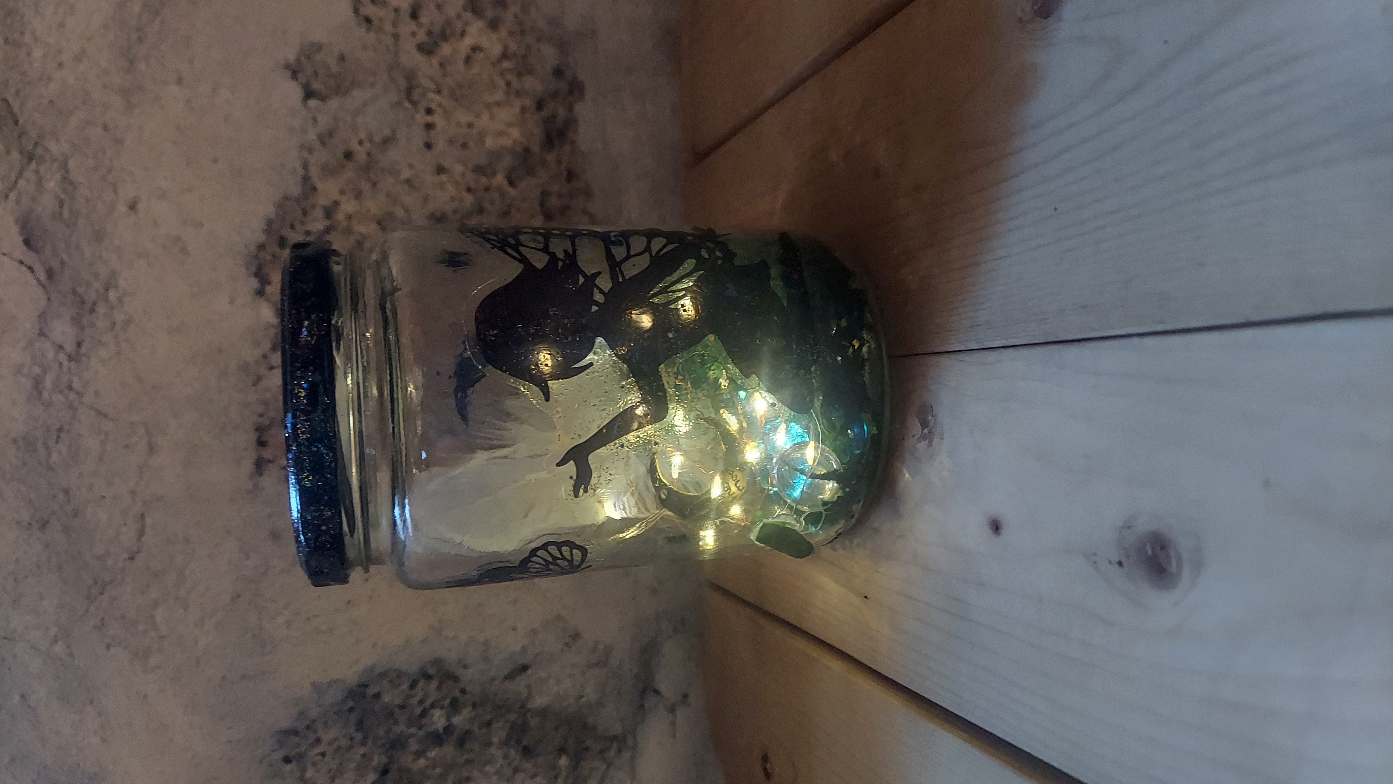 Fairy butterfly Jar with blue stones and feather