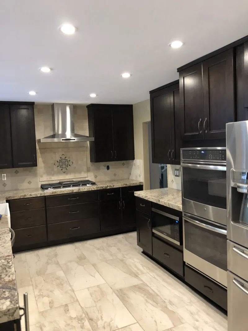 Espresso shaker kitchen with stainless appliances