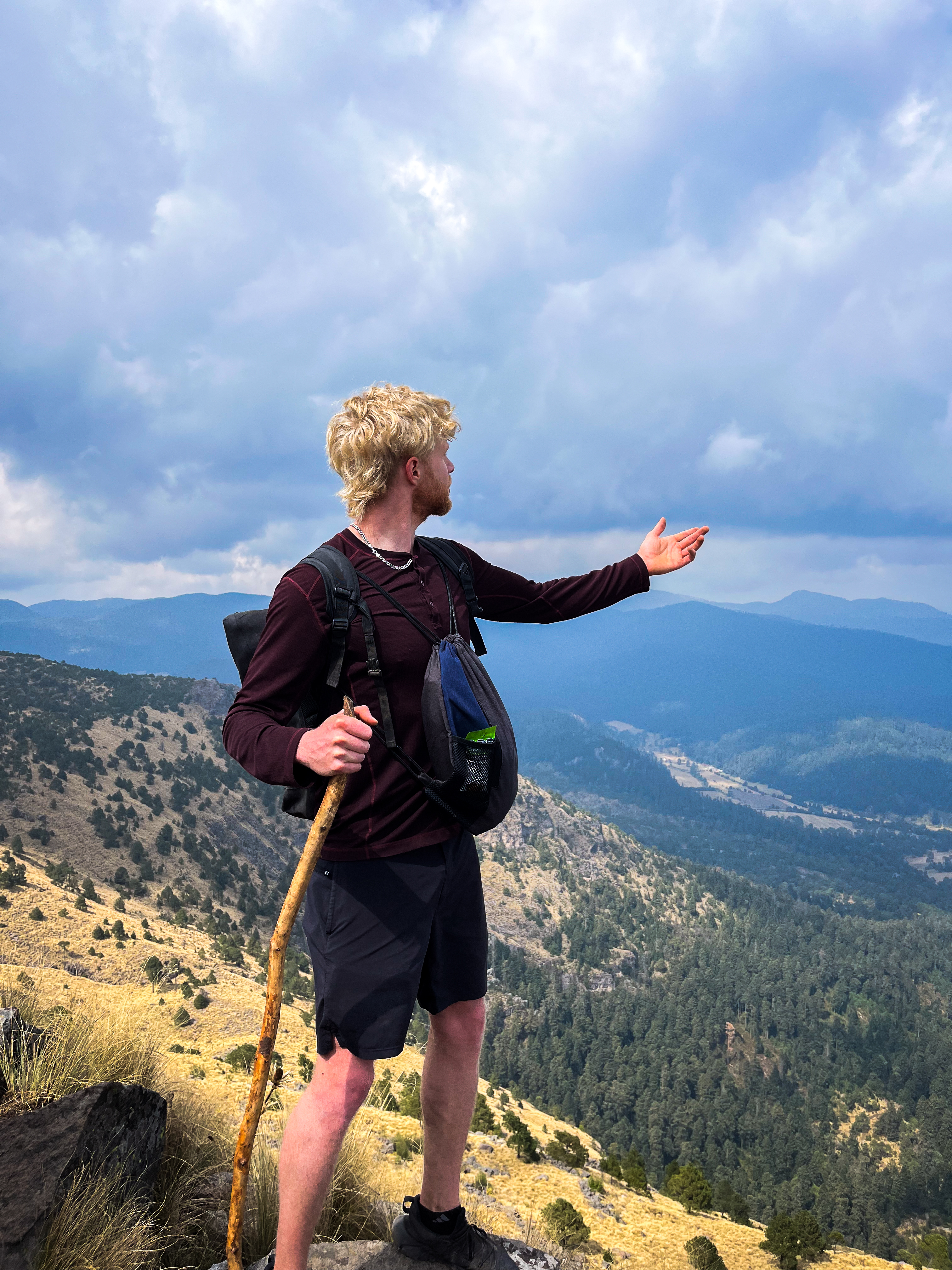 Hiker looking out across the Valley of Mexico from Ajusco