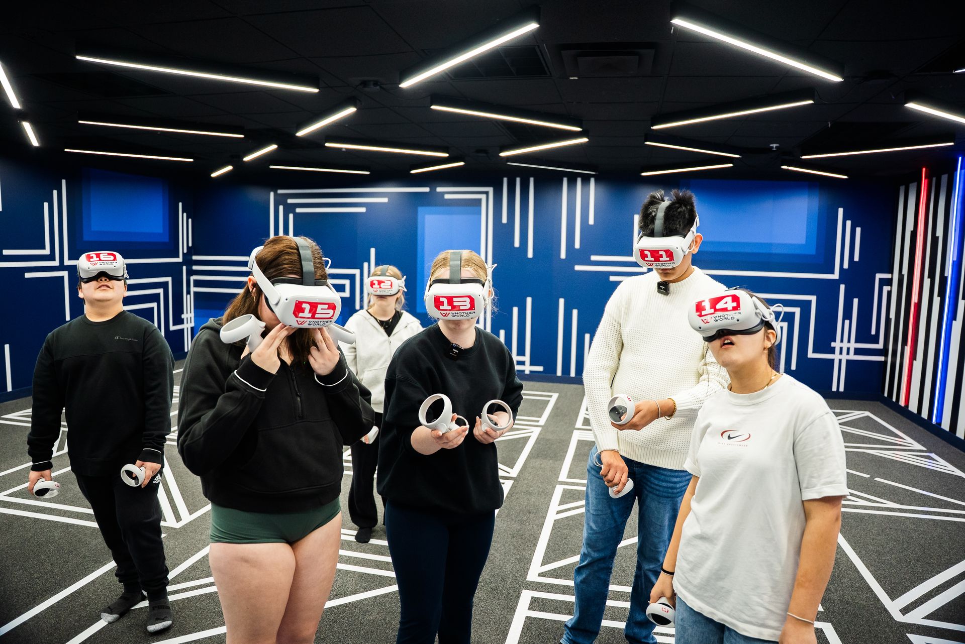 A close group of students in headsets
