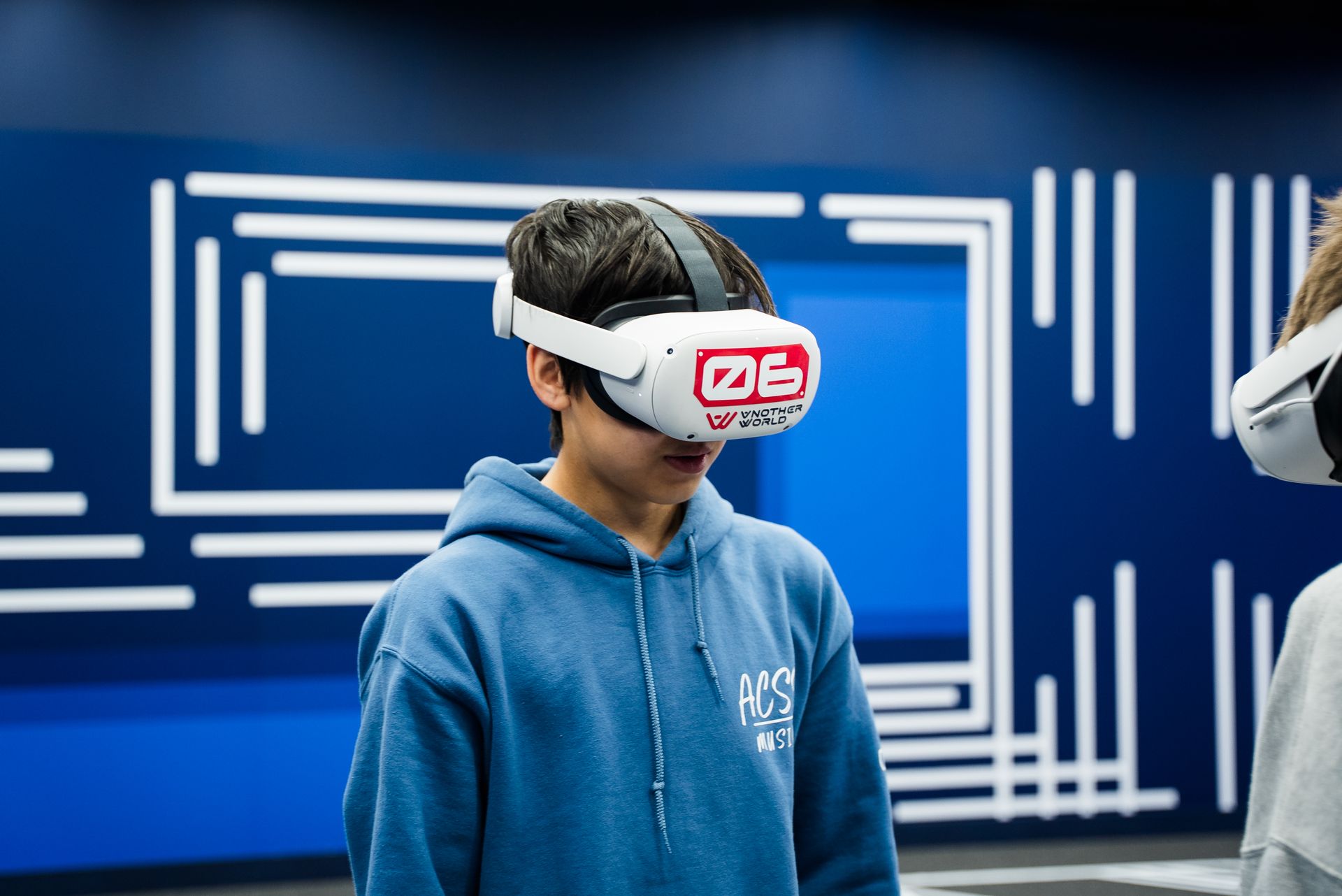 A student in headset number 06