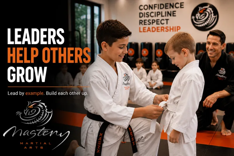 Older martial arts student helping a younger student learn a new technique. Older martial arts student helping a younger student learn a new technique.