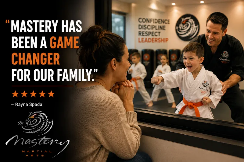 Mother watching her child succeed during a Mastery Martial Arts class. Mother watching her child succeed during a Mastery Martial Arts class.