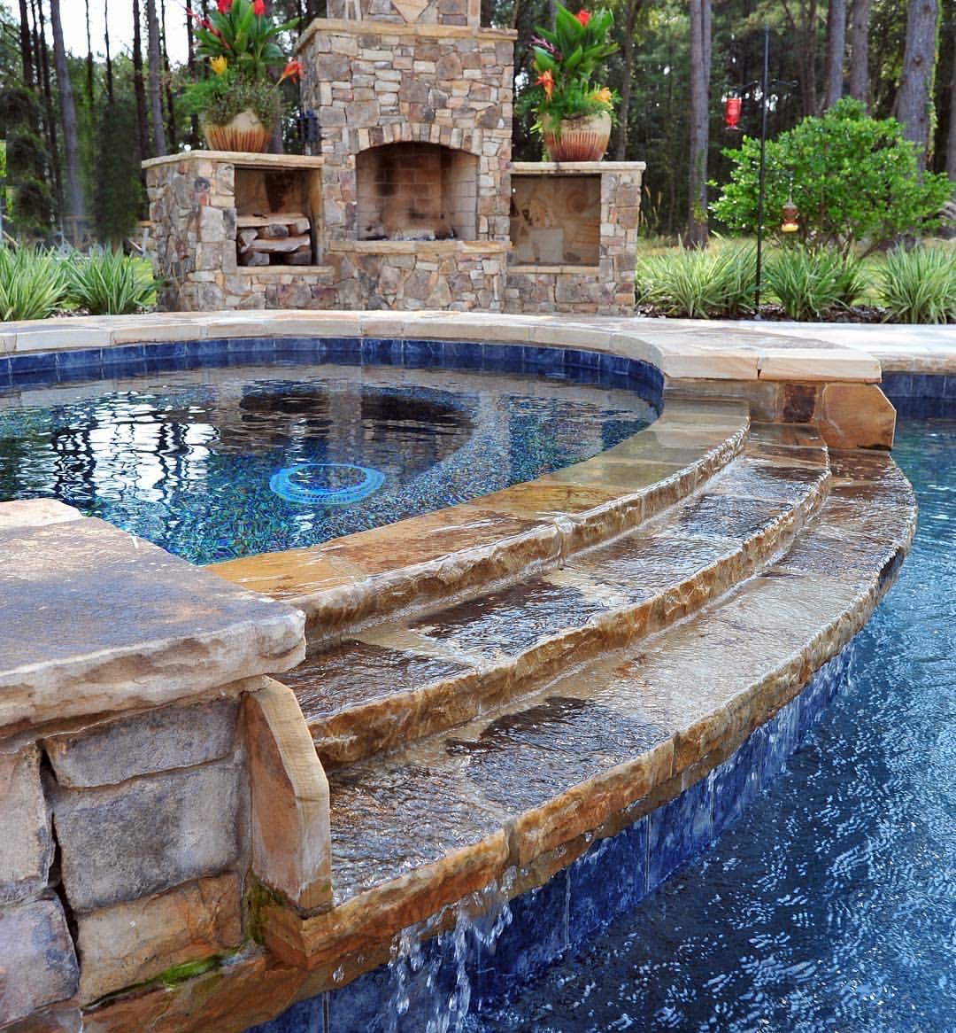 Pool, spa and stone fireplace
