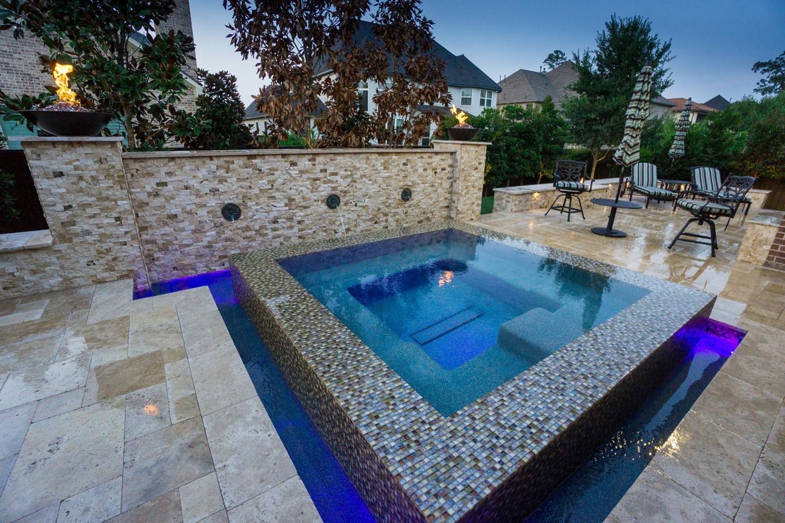 Raised spa and stone wall