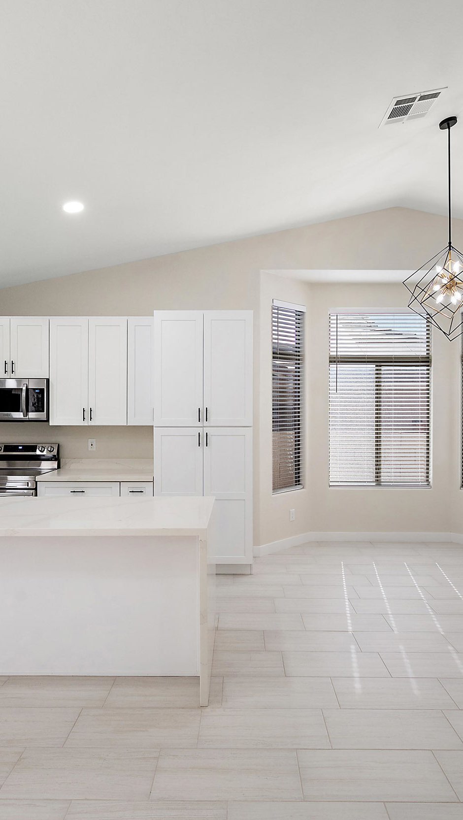 Modern white kitchen remodel with island — kitchen remodeling Mesa AZ