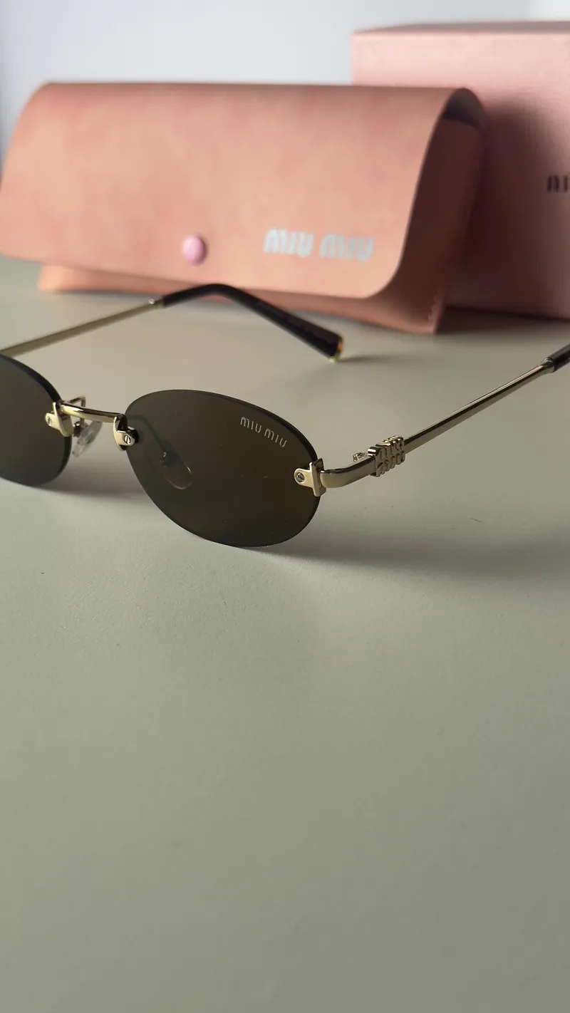 Miu Miu - Sunglasses Brown Lenses 