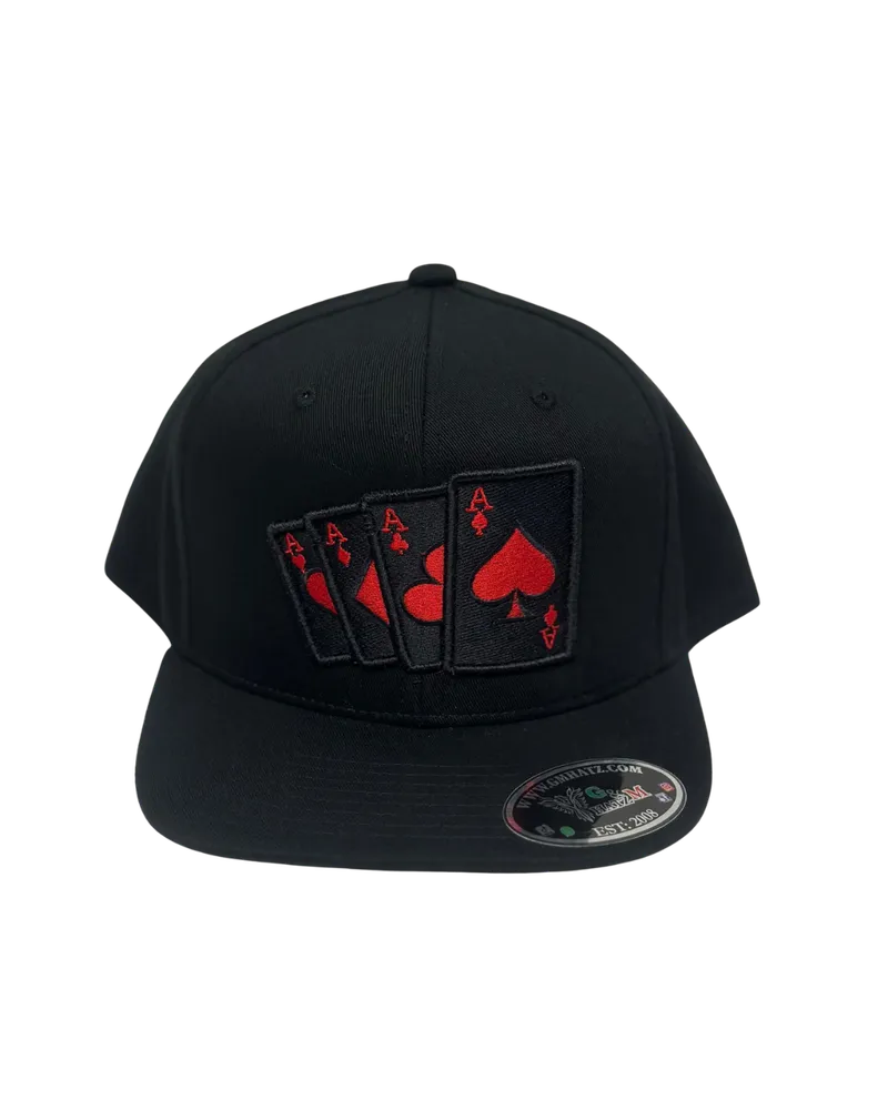 Black cap with red hearts
