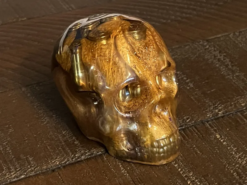 Bullet Casing Resin Skull – Gold & Bronze, 3"