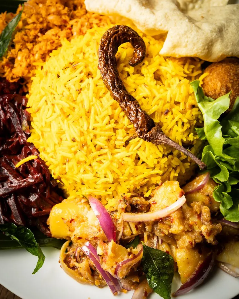 Seafood with baby octopus served over fragrant yellow rice