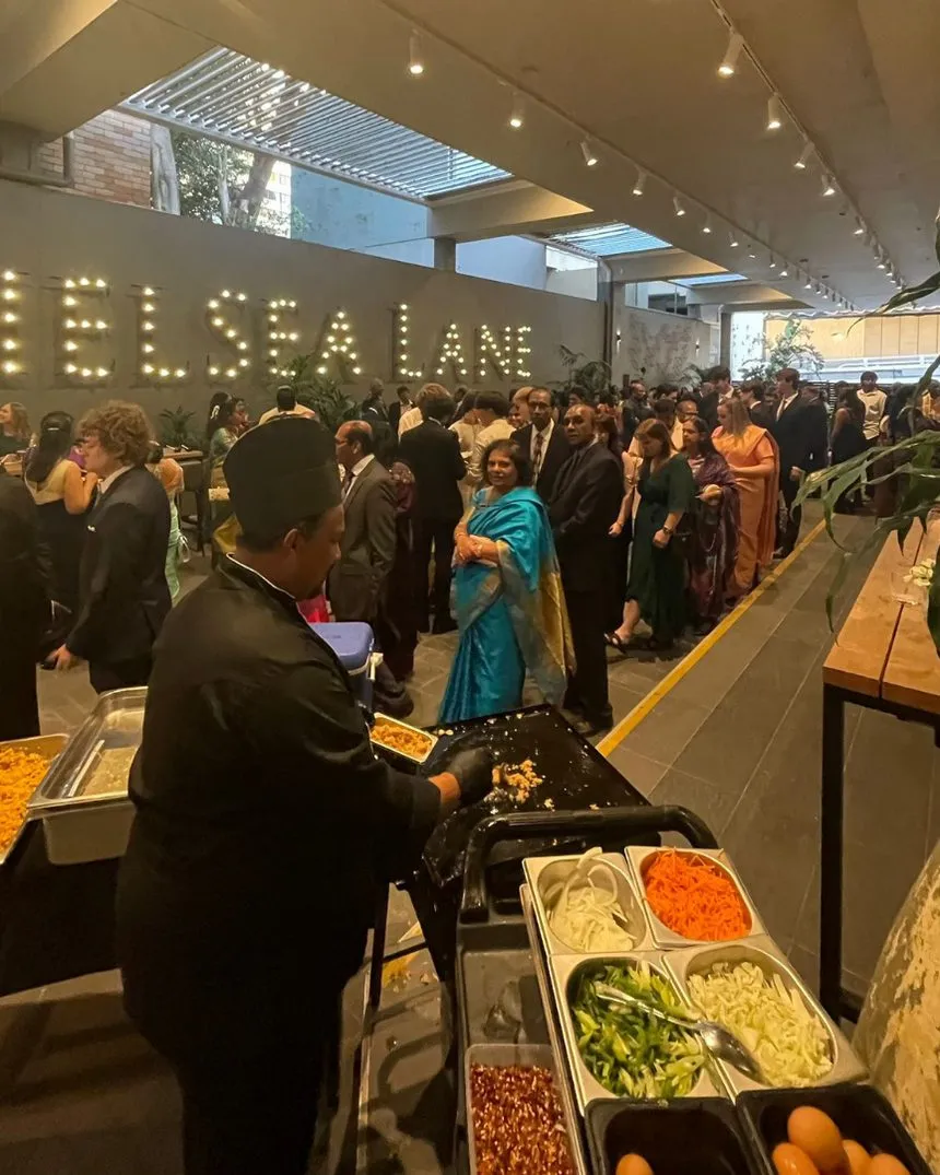 Guests queueing at a Walkway to Ceylon buffet at an evening event