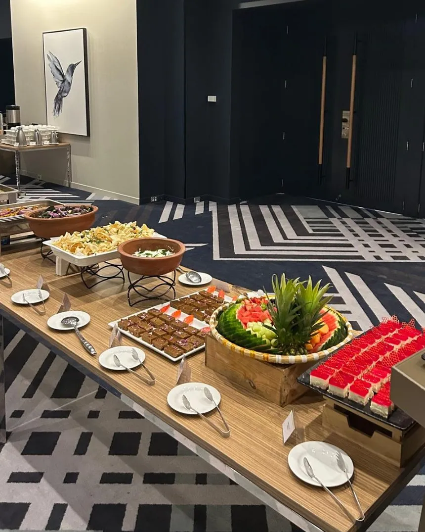 A catered function room set with buffet tables