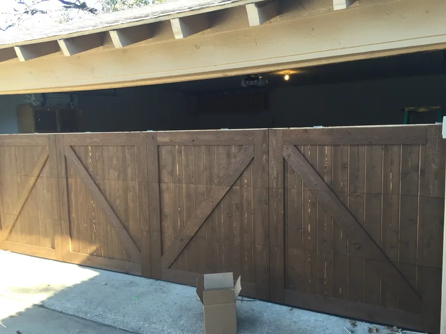 Cedar garage door with a cross-buck design