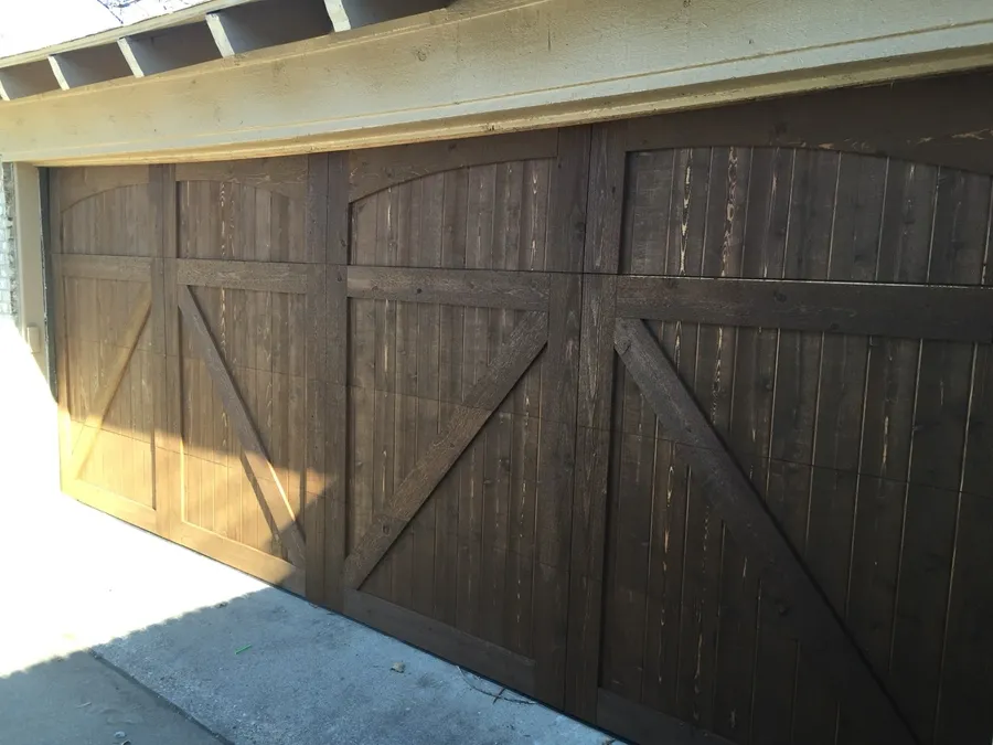 Dark stained cedar garage door