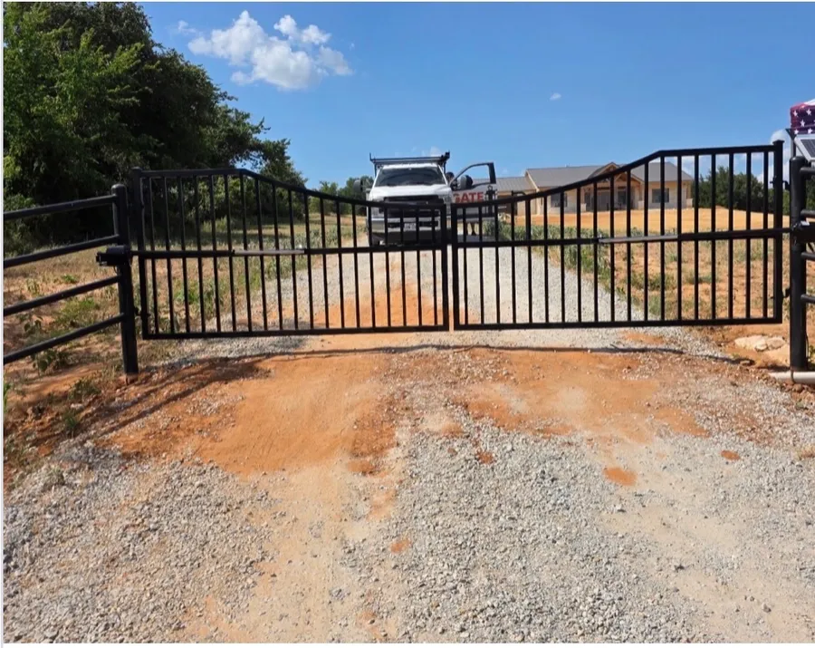 Gate across a gravel driveway