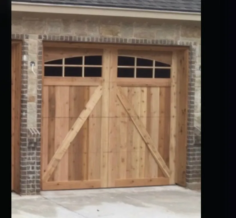 Single cedar garage door with arched windows