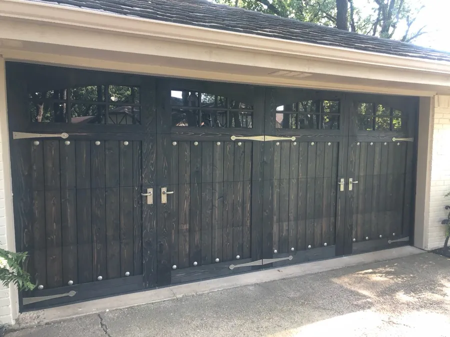 Cedar carriage doors finished in a dark stain