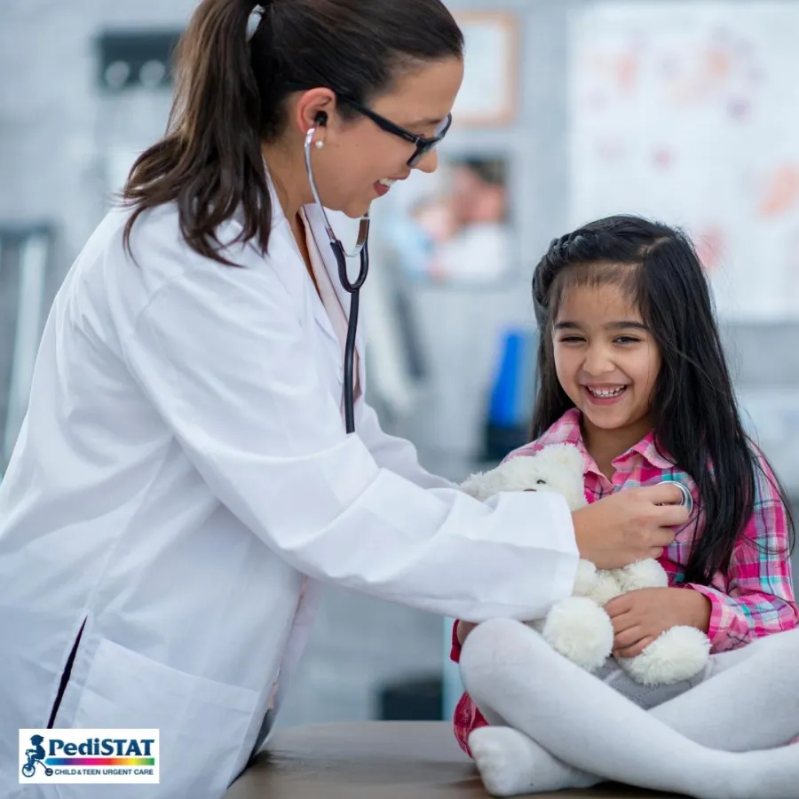 Pediatrician examining a young girl during a same-day visit