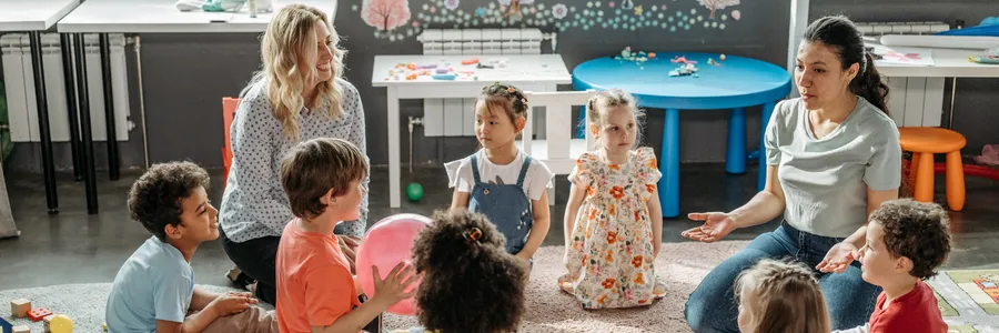 Learners on the floor with a Guide
