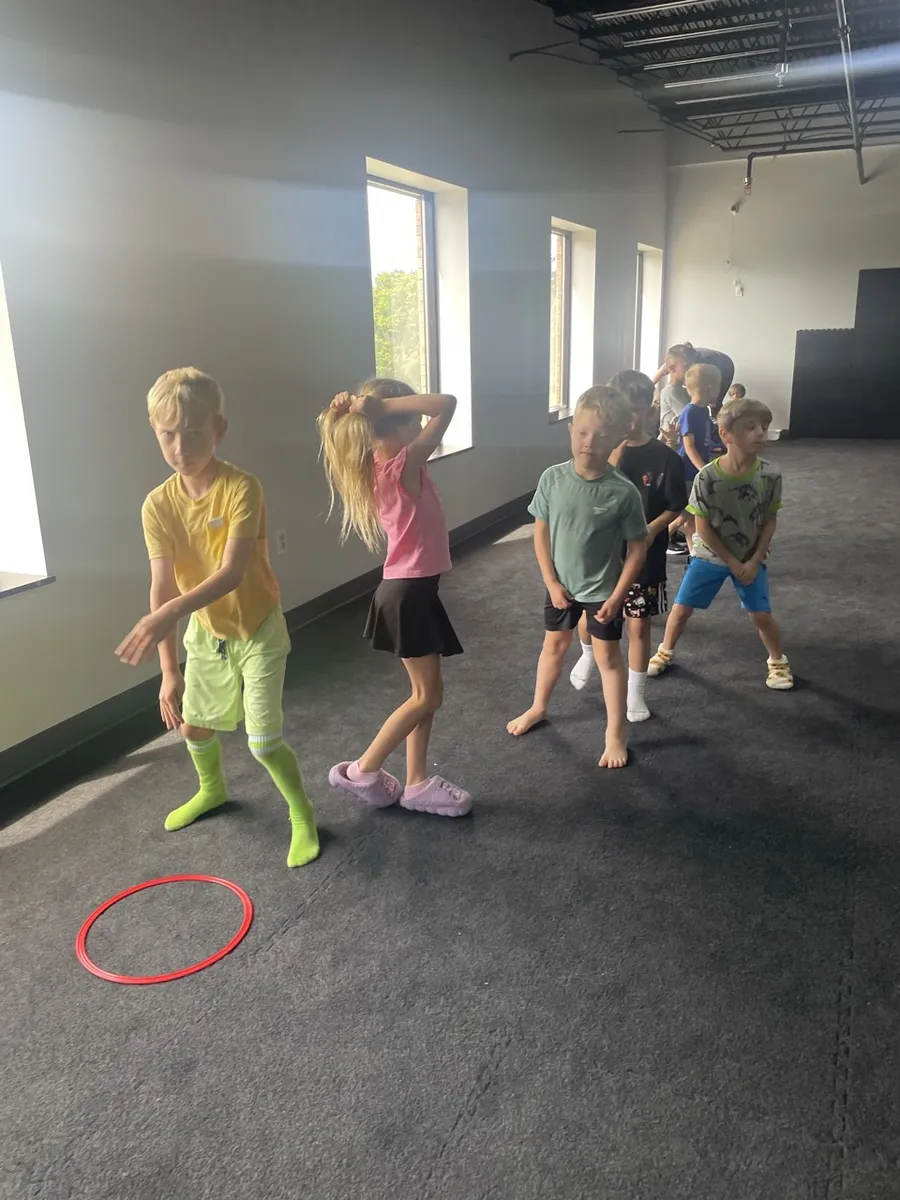 Learners playing with hula hoops
