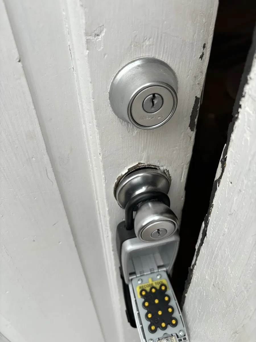 Deadbolt and lockbox on a residential door
