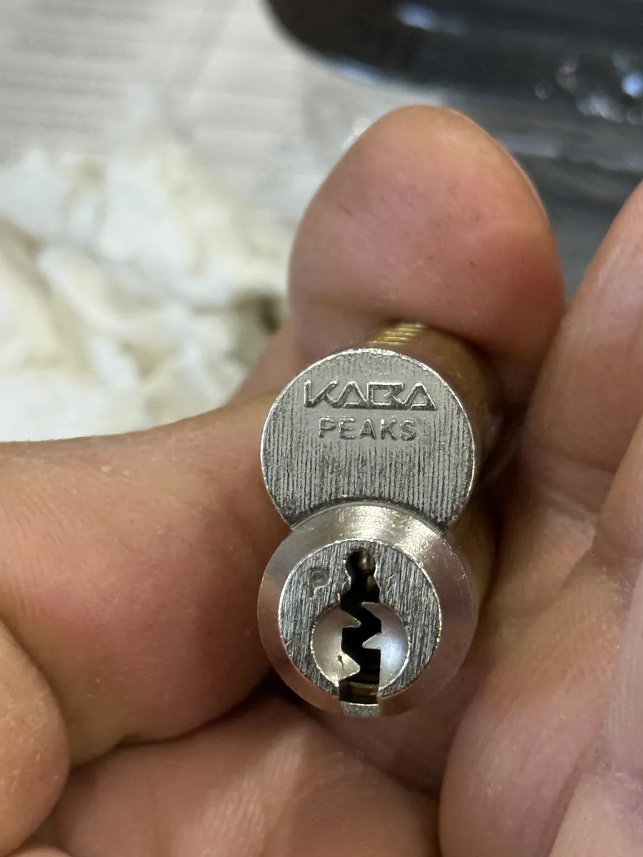 Kaba lock cylinder held in hand