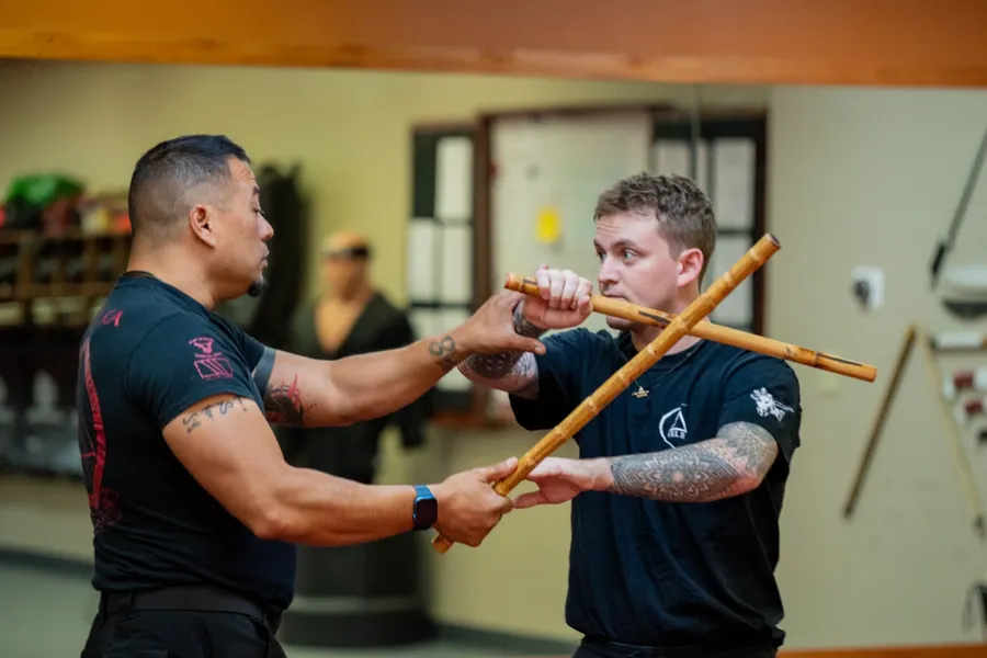 Partner stick drill during Inayan System of Eskrima training