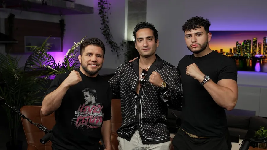 Arian with podcast hosts