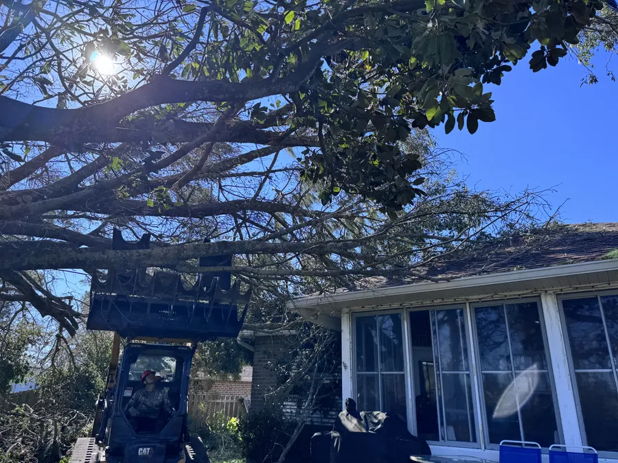 Crew working into the evening on Gulf Coast storm clean-up
